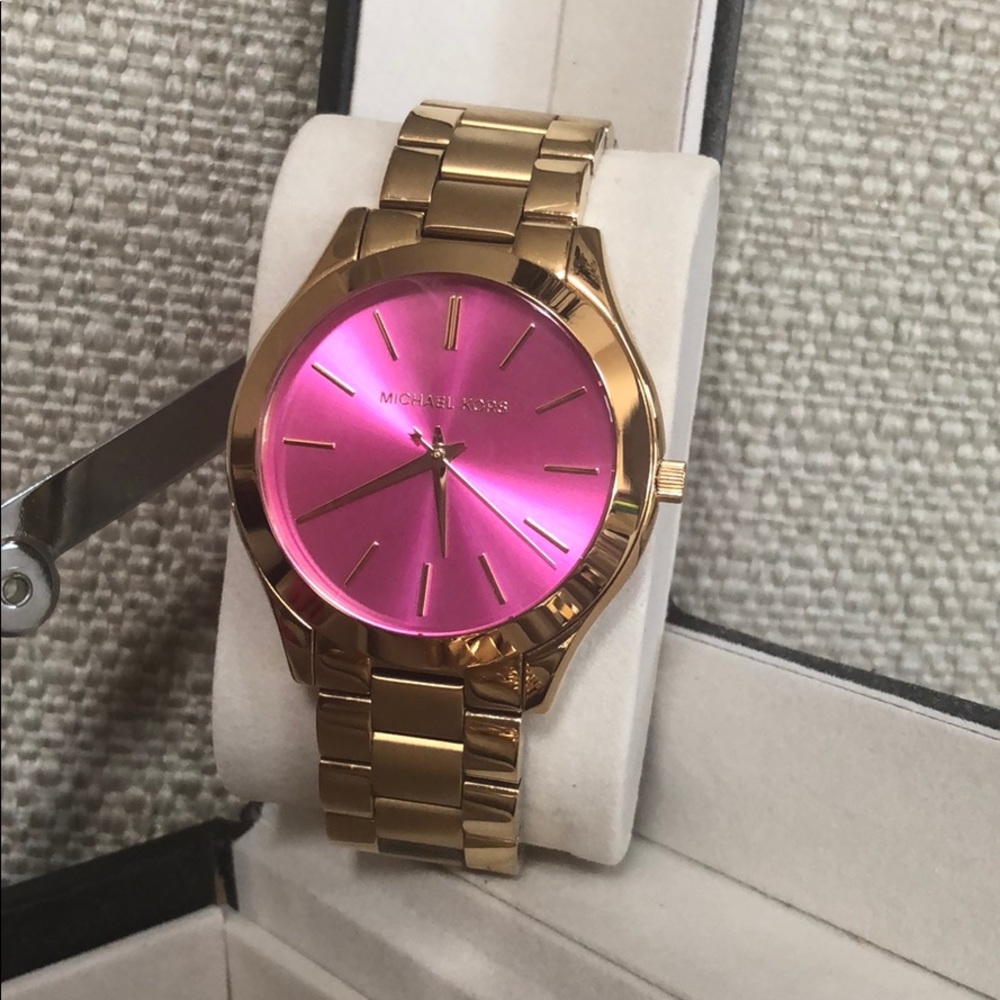 Michael Kors watch, gold with hot pink face